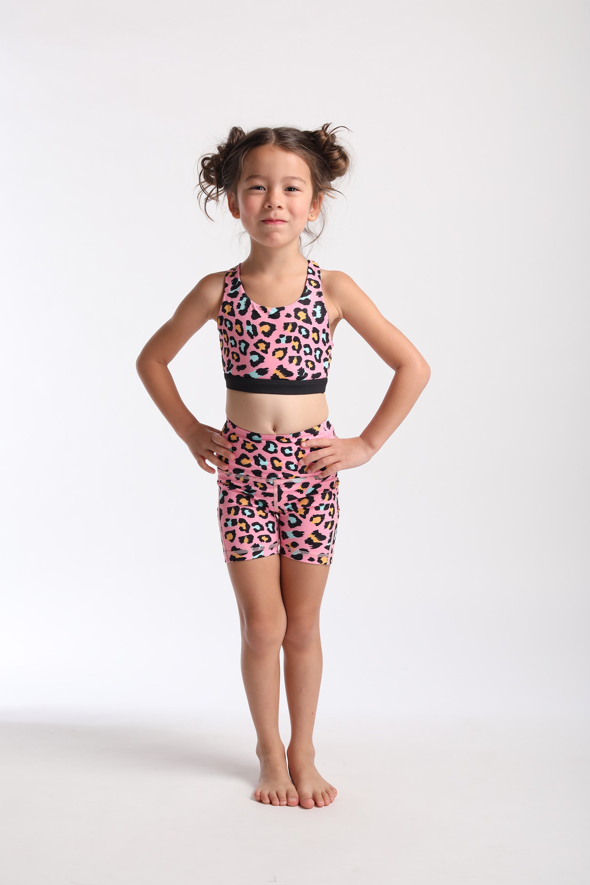Kids top in Neon Pink from Flexi Lexi with details on back